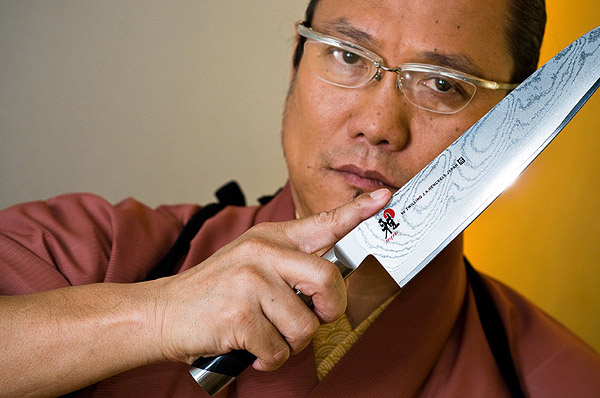 Chef Morimoto holding Chef knife